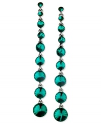 Look terrific in teal with this pair of linear earrings from GUESS. Crafted from hematite-tone mixed metal, the earrings dazzle with glass crystal stones. Item comes packaged in a signature GUESS Gift Box. Approximate drop: 4 inches. Look terrific in teal with this pair of linear earrings from GUESS. Crafted from hematite-tone mixed metal, the earrings dazzle with glass crystal stones. Item comes packaged in a signature GUESS Gift Box. Approximate drop: 4 inches.