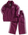 She's an all-star player. Have her learn the rules in this comfy adidas tricot jacket and pants set.