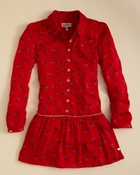 With a gold-trimmed drop waistline and proper puff sleeves, Juicy Couture updates the floral print shirtdress with their signature glamor and wit. With a gold-trimmed drop waistline and proper puff sleeves, Juicy Couture updates the floral print shirtdress with their signature glamor and wit.