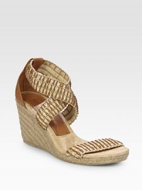 Woven straw and leather straps grounded by an espadrille wedge and comfortable rubber sole. Hemp-covered wedge, 3 (75mm)Hemp-covered platform, ½ (15mm)Compares to a 2½ heel (65mm)Leather and straw upperLeather and straw liningRubber soleImportedOUR FIT MODEL RECOMMENDS ordering true size. Woven straw and leather straps grounded by an espadrille wedge and comfortable rubber sole. Hemp-covered wedge, 3 (75mm)Hemp-covered platform, ½ (15mm)Compares to a 2½ heel (65mm)Leather and straw upperLeather and straw liningRubber soleImportedOUR FIT MODEL RECOMMENDS ordering true size.