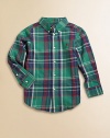 A plaid button-down shirt embroidered with Ralph Lauren's signature pony provides a timeless, handsome look.Pointed button-down collarLong sleeves with single-button barrel cuffsButton-frontShirttail hemCottonMachine washImported Please note: Number of buttons may vary depending on size ordered. 