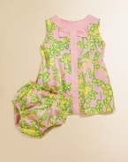 Lively bunnies and flowers adorn this simple silhouette with contrasting trim and matching bloomers.Jewelneck with bowSleevelessBack button closureFully linedCottonMachine washImported