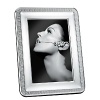 Showcase your most precious pictures with this highly polished silverplate frame embellished with a leaf motif. Its timeless design will add value to photos and style to your home.