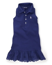 The classic cotton-mesh polo dress is given a sweet warm-weather look in a sleeveless silhouette with a cute eyelet skirt. The classic cotton-mesh polo dress is given a sweet warm-weather look in a sleeveless silhouette with a cute eyelet skirt.