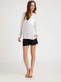 A playful front pocket is featured on this elegantly-draped design of rich silk, for an casual-chic look. V-neck with placketDropped shouldersLong sleeves with button cuffsFront patch pocketBack pleatsSide-split hemSilkDry cleanImportedModel shown is 5'10 (177cm) wearing US size Small. A playful front pocket is featured on this elegantly-draped design of rich silk, for an casual-chic look. V-neck with placketDropped shouldersLong sleeves with button cuffsFront patch pocketBack pleatsSide-split hemSilkDry cleanImportedModel shown is 5'10 (177cm) wearing US size Small.