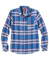 Deep blue. The bright pop of this Quiksilver plaid shirt will add a modern edge to his outfit.