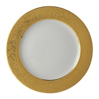 Featuring a spectacular patterned band that recalls the golden majesty of sunlight, this superior plate from Bernardaud lends dramatic sophistication to your elegant table setting. Featuring a spectacular patterned band that recalls the golden majesty of sunlight, this superior plate from Bernardaud lends dramatic sophistication to your elegant table setting.