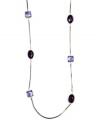 Lovely in lavender. This pretty station necklace by AK Anne Klein adds the perfect last layer to your daily look. With plastic purple accents, it's crafted in imitation rhodium-plated mixed metal. Approximate length: 36 inches.