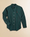 A button-down shirt in soft cotton poplin is perfectly preppy in a bold-hued plaid.Button-down collarLong sleeves with barrel cuffsButton-frontSplit back yokeShirttail hemCottonMachine washImported Please note: Number of buttons may vary depending on size ordered. 