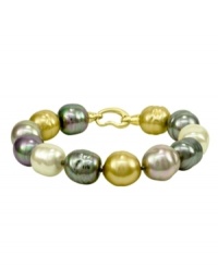 Rich, seaside hues lend intrigue to this Majorica bracelet featuring champagne, nuage, gray and white man-made baroque pearls (14 mm). Bracelet crafted from sterling silver. Approximate length: 7 inches. Rich, seaside hues lend intrigue to this Majorica bracelet featuring champagne, nuage, gray and white man-made baroque pearls (14 mm). Bracelet crafted from sterling silver. Approximate length: 7 inches.