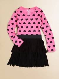 A retro-inspired fringed skirt is paired with a heart-adorned scoopneck for a look she'll love.ScoopneckLong sleevesPullover styleElastic waistbandFringe hem85% rayon/15% spandexHand washImported A retro-inspired fringed skirt is paired with a heart-adorned scoopneck for a look she'll love.ScoopneckLong sleevesPullover styleElastic waistbandFringe hem85% rayon/15% spandexHand washImported