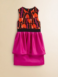 She'll set hearts afire in this fiery frock in an on-trend peplum sil;houette.Pleated jewelneckSleevelessExposed back zipperBanded waistbandPeplum layerPolyester/CottonDry cleanMade in the USA of imported fabric She'll set hearts afire in this fiery frock in an on-trend peplum sil;houette.Pleated jewelneckSleevelessExposed back zipperBanded waistbandPeplum layerPolyester/CottonDry cleanMade in the USA of imported fabric