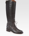 Simple laces top this equestrian-inspired leather silhouette, with detailed seaming and a rubber sole for extra traction. Stacked heel, 1½ (40mm)Shaft, 16Leg circumference, 14Leather upperLeather liningRubber solePadded insoleImported