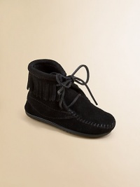 A traditional moccasin gets a cute and stylish update in a high-top design with 70's-inspired fringe and front tie.Tie closureSuede upperRubber solePadded insoleImported