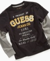 Cool and comfortable. This long sleeve layered t-shirt by Guess will keep him looking cool with an added thermal underneath to keep him warm.