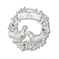 Gleaming in polished silver plate, this sculptural ornament is detailed with twinkling crystal stones for a look that's festive and traditional. Gleaming in polished silver plate, this sculptural ornament is detailed with twinkling crystal stones for a look that's festive and traditional.