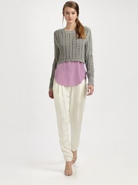 A chunky twisted yarn from Italy in an airy, open stitch and a modern cropped length.Ribbed crewneckLong sleeves with deep ribbed cuffsCropped, contour ribbed hemAbout 18 from shoulder to hem70% cotton/30% nylonDry cleanImported of Italian fabric A chunky twisted yarn from Italy in an airy, open stitch and a modern cropped length.Ribbed crewneckLong sleeves with deep ribbed cuffsCropped, contour ribbed hemAbout 18 from shoulder to hem70% cotton/30% nylonDry cleanImported of Italian fabric