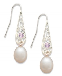 Stunning in silver. Sterling-silver drop earrings exude style with silver cultured freshwater pearls (8-9 mm) and round-cut amethysts (1/6 ct. t.w.). Approximate drop: 1-1/2 inches. Stunning in silver. Sterling-silver drop earrings exude style with silver cultured freshwater pearls (8-9 mm) and round-cut amethysts (1/6 ct. t.w.). Approximate drop: 1-1/2 inches.