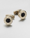 Round gold-tone cuff links with onyx center and engraved zodiac sign motif.Brass/onyxAbout ¾ diam.Made in Italy