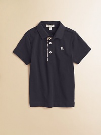 The beloved classic, in airy pique with woven check trim.Ribbed polo collar Short sleeves Front button placket with woven check trim Embroidered chest logo Cotton; machine wash Imported Please note: Number of buttons may vary depending on size ordered. The beloved classic, in airy pique with woven check trim.Ribbed polo collar Short sleeves Front button placket with woven check trim Embroidered chest logo Cotton; machine wash Imported Please note: Number of buttons may vary depending on size ordered.