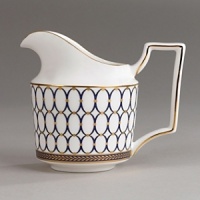 Embellished with intricate garlands, oval links and a fanciful dragon motif, this Wedgwood dinnerware evokes Europe's glorious Renaissance period. Rendered in deep blue and gold to transform any formal meal into a spectacular royal gala. Embellished with intricate garlands, oval links and a fanciful dragon motif, this Wedgwood dinnerware evokes Europe's glorious Renaissance period. Rendered in deep blue and gold to transform any formal meal into a spectacular royal gala.