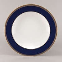 Embellished with intricate garlands, oval links and a fanciful dragon motif, this Wedgwood dinnerware evokes Europe's glorious Renaissance period. Rendered in deep blue and gold to transform any formal meal into a spectacular royal gala. Embellished with intricate garlands, oval links and a fanciful dragon motif, this Wedgwood dinnerware evokes Europe's glorious Renaissance period. Rendered in deep blue and gold to transform any formal meal into a spectacular royal gala.