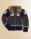 A charming cardigan in a soft blend of plush yarns captures the spirit of the season with a classic intarsia-knit reindeer design and faux-fur collar.Faux fur crewneckLong sleevesButton-frontCottonHand washImported Please note: Number of buttons may vary depending on size ordered. 