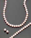 The soft, pink hue of the cultured freshwater pearl collection (4.5-5 mm) updates a classic style. Set includes 14k gold necklace (measuring 18 inches), bracelet (measuring 7.5 inches) and stud earrings.