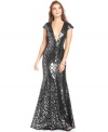 Have a flair for the dramatic? BCBGMAXAZRIA's deco-inspired sequined gown was made for you--cap sleeves and a daring V-neckline are electrifying touches.