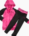 Shine with style. Sweet sparkle hearts lining the waist of these leggings from Puma give her a cozy and cute look.