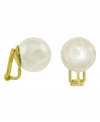 Always classic clip on stud earrings from the island of Mallorca, Spain. Featuring white round organic man-made pearls (14 mm) set in 18k gold over sterling silver.