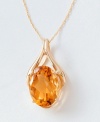 The golden beauty of an oval-cut citrine (8 ct. t.w.) is captured in this graceful 14k gold wishbone pendant. Chain measures 18 inches; drop measures 1-1/4 inch.