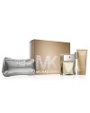 The Michael Kors Gorgeous Holiday Set includes Eau de Parfum spray 3.4 oz., a fabulous body lotion 3.4 oz., Eau de Parfum rollerball 0.2 oz., and a silver, embossed python cosmetics bag-all presented in a signature gift box.