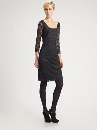 Romantic lace design is finished with scalloped edges at the neck, sleeves and hem.Wide scoop neckline Sheer three-quarter sleeves About 37 from shoulder to hem 42% nylon/25% polyester/17% spandex/16% rayon Dry clean Imported Romantic lace design is finished with scalloped edges at the neck, sleeves and hem.Wide scoop neckline Sheer three-quarter sleeves About 37 from shoulder to hem 42% nylon/25% polyester/17% spandex/16% rayon Dry clean Imported