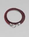 A richly-hued braided leather bracelet perfect for layering and wrap around styling.LeatherAbout 3 diam.Spring claspMade in Italy