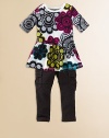 This boldly printed knit features an asymmetrical dropped waist for an unexpected touch.Contrast piped crewneckBold floral printPullover styleAsymmetrical dropped waistCottonMachine washImported