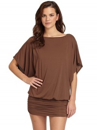 THE LOOKBoatneckDolman sleevesDropped waistSide ruched skirtTHE FITAbout 33 from shoulder to hemTHE MATERIAL87% nylon/13% spandexCARE & ORIGINHand washImported THE LOOKBoatneckDolman sleevesDropped waistSide ruched skirtTHE FITAbout 33 from shoulder to hemTHE MATERIAL87% nylon/13% spandexCARE & ORIGINHand washImported