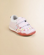 Crafted in plush leather with pretty flowers, stripes, checks and polka dots, these cozy double grip-tape kicks will keep her going for miles and miles.Double grip-tape closureLeather upperLeather liningRubber solePadded insoleImported