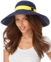Channel vintage glamour with this classic floppy sun hat accented by grosgrain ribbon. By Lauren by Ralph Lauren.