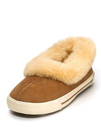 Wear these sporty slippers with a sneaker-like bottom indoors or outdoors! With genuine shearling cuffs for a cozy touch. Wear these sporty slippers with a sneaker-like bottom indoors or outdoors! With genuine shearling cuffs for a cozy touch.