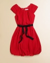 A striking, shirred frock with ribbon tie and bubble hem for your little lady in red.JewelneckShirred cap sleevesBack zipperWaistband with ribbon tieBubble hemFully linedPolyesterHand washImported