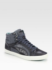 Textured cotton and smooth leather are joined together in this edgy sneaker style with street-style inspiration.Cotton/leather upperLeather liningPadded insoleRubber soleImported Textured cotton and smooth leather are joined together in this edgy sneaker style with street-style inspiration.Cotton/leather upperLeather liningPadded insoleRubber soleImported