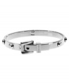 Buckle up for fast fashion. Michael Kors' buckled bangle bracelet polishes up your look with little effort. Crafted in silver tone steel. Approximate diameter: 2-1/2 inches.