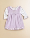 A lavender print, pima cotton bodysuit meets a ruffled jumper for a set as precious as baby. Bodysuit Ruffled crewneckLong sleeves with ruffled cuffsBack snapsBottom snaps Jumper CrewneckSleevelessBack snapsRuffled hemJumper: 80% cotton/20% polyesterPima cottonMachine washImported Please note: Number of snaps may vary depending on size ordered. 