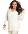 Shine this season in DKNY's high-low hem plus size sweater, featuring a sequined finish.