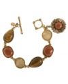 Grab the eye of the tiger. This chic style from Lucky Brand features semi-precious tiger's eye stones and plastic and glass accents. Set in gold tone mixed metal with toggle closure. Approximate length: 7-5/8 inches.