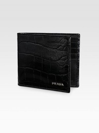 Fine calfskin leather with silvertone logo accent. Two bill compartments, eight card slots 4¼W X 3¾H Made in Italy Fine calfskin leather with silvertone logo accent. Two bill compartments, eight card slots 4¼W X 3¾H Made in Italy