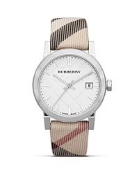 Freshen up your face with this stainless steel watch from Burberry, accented by a check stamped dial. With Swiss movement and a slim profile, this understated style is a functional day-to-day choice. Freshen up your face with this stainless steel watch from Burberry, accented by a check stamped dial. With Swiss movement and a slim profile, this understated style is a functional day-to-day choice.