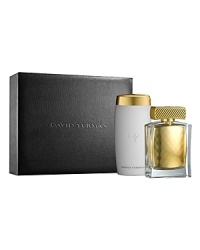 The David Yurman Elegant Expressions Collection features the 1.7 fl. oz. Eau de Parfum in a stunning, faceted golden jewel captured in a hand-polished crystal bottle, and crowned with a sculpted gold cap inspired by the iconic cable design. Also included is the perfect complement to the spray, the 6.8 oz. net wt. Luxurious Body Lotion. Packaged in a translucent, elongated bottle with a gold, flip top cap, accented with the David Yurman signature cable motif, the Luxurious Body Lotion envelops your skin in a sumptuous veil of softness. The collection is featured in a re-usable black, faux-lizard textured signature gift box with the David Yurman logo debossed on the cover. This set includes a 1.7 fl. oz. Eau de Parfum Spray, and a 6.8 oz. net wt. Luxurious Body Lotion. The David Yurman Elegant Expressions Collection features the 1.7 fl. oz. Eau de Parfum in a stunning, faceted golden jewel captured in a hand-polished crystal bottle, and crowned with a sculpted gold cap inspired by the iconic cable design. Also included is the perfect complement to the spray, the 6.8 oz. net wt. Luxurious Body Lotion. Packaged in a translucent, elongated bottle with a gold, flip top cap, accented with the David Yurman signature cable motif, the Luxurious Body Lotion envelops your skin in a sumptuous veil of softness. The collection is featured in a re-usable black, faux-lizard textured signature gift box with the David Yurman logo debossed on the cover. This set includes a 1.7 fl. oz. Eau de Parfum Spray, and a 6.8 oz. net wt. Luxurious Body Lotion.
