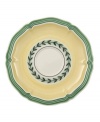 In sunny yellow porcelain with a scalloped edge and pretty vine detail, this French Garden after-dinner saucer is perfectly at home on casual country tables.
